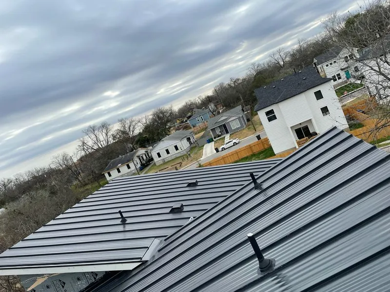 Standing seam metal roof panels with vents for Skylight Repair in Downers Grove